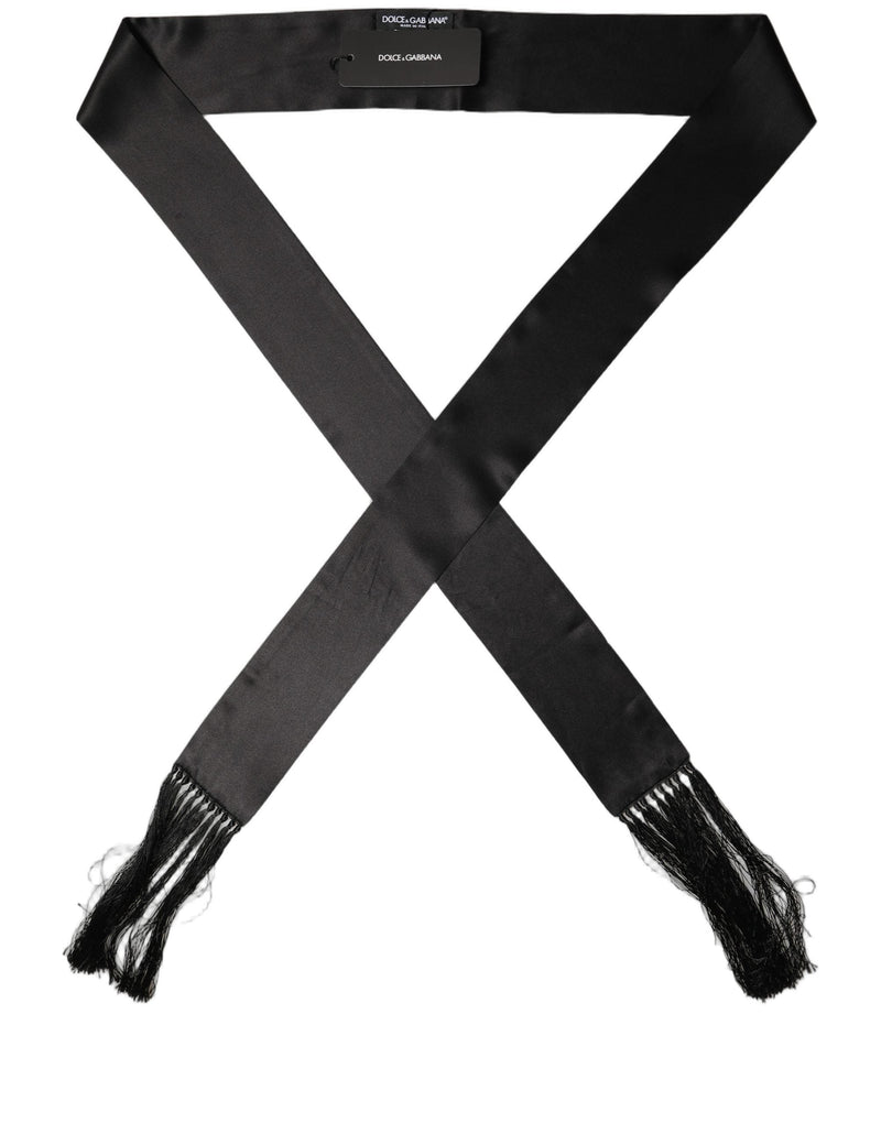 Black satin silk scarf used by THE NOTICE to illustrate storage, surface care and seasonal return.
