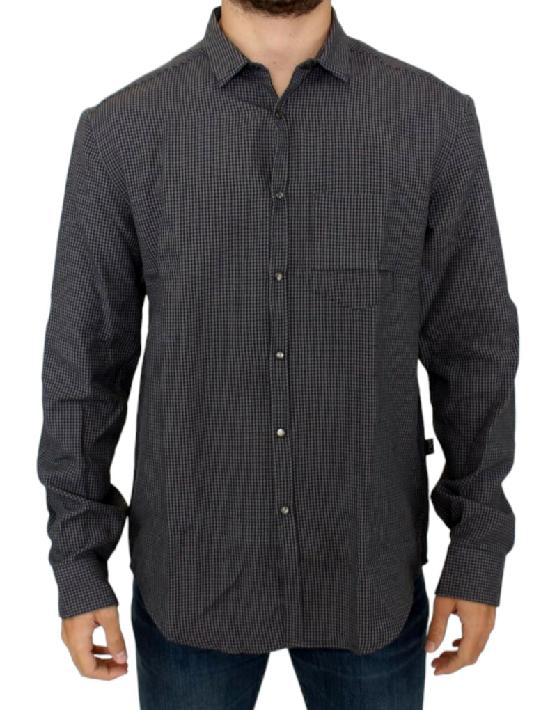 Gray linen shirt used by THE NOTICE to anchor a resort wardrobe in cool, wearable material rather than destination costume.