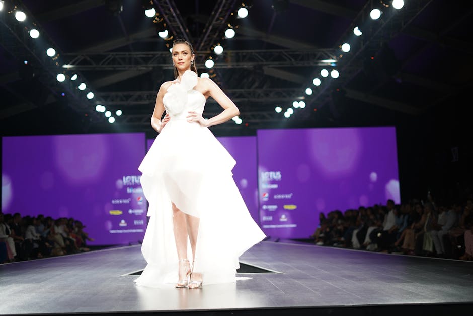 Couture dress on a quiet runway in white and neutral light for THE NOTICE by THE GRAY CRAB